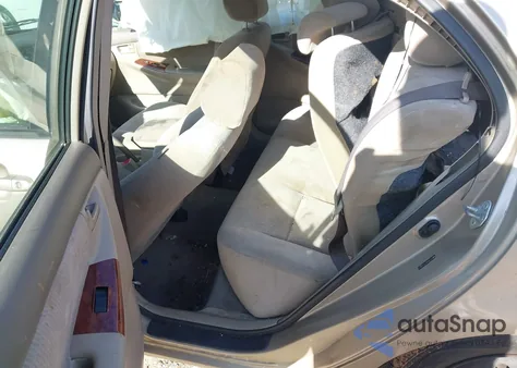 2005 Toyota Corolla Le z USA, uszkodzony, nr VIN 2T1BR30E75C456912